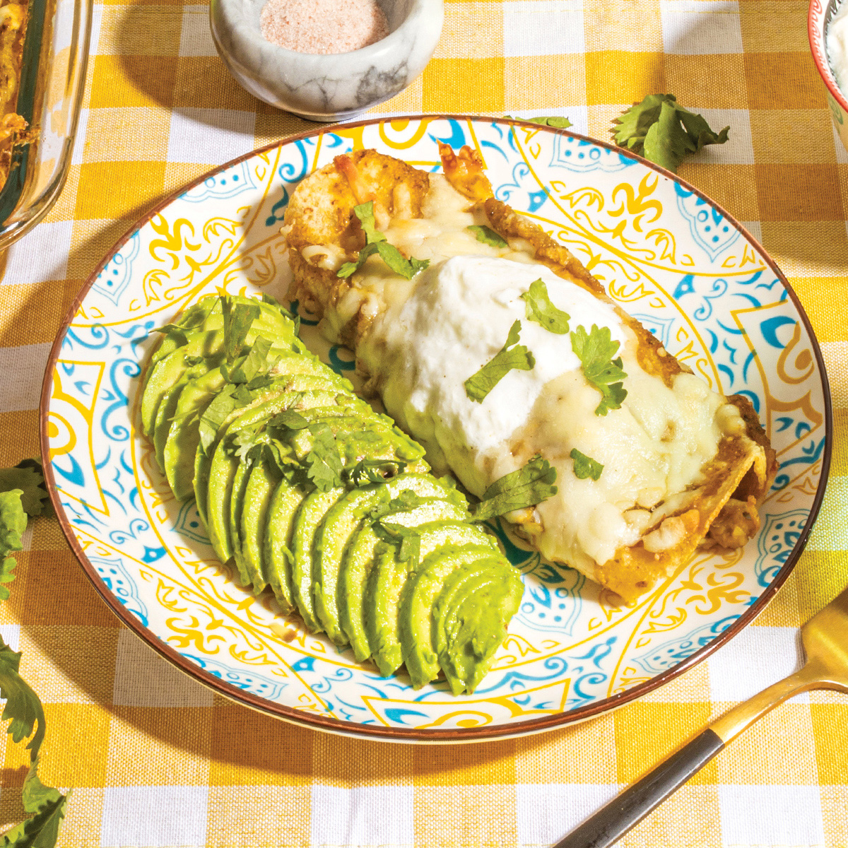 Enchilada with a side of avocado