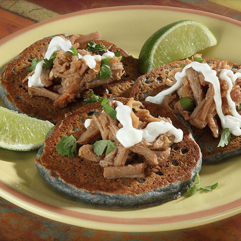 Blue-Corn Blini with Maple-Chile-Braised Pork Belly & Cilantro