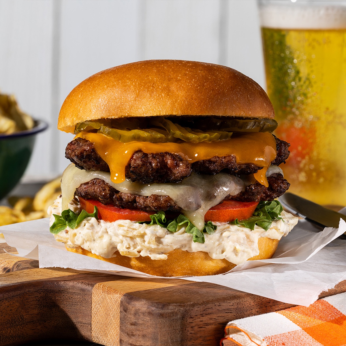 Double Cheddar Smash Burgers with Creamy Caramelized Onion Sauce